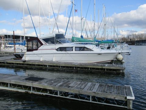 1991 WELLCRAFT 341 TRIUMPH AMERICUS Express Cruiser, Raised Helm, Twins, 7.5KW for sale