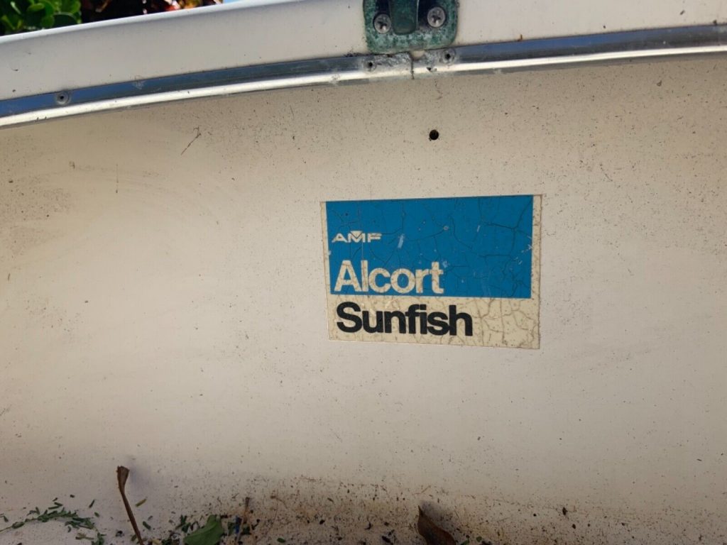 1973 AMF Alcort Sunfish with rigging and as-is dolly