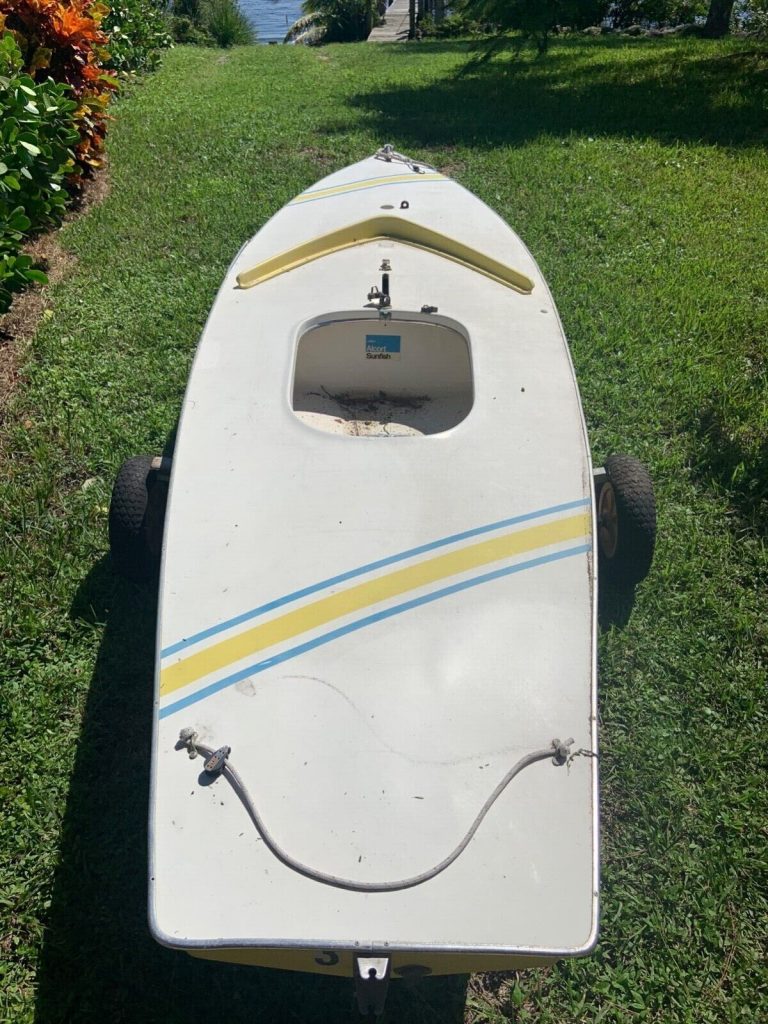 1973 AMF Alcort Sunfish with rigging and as-is dolly