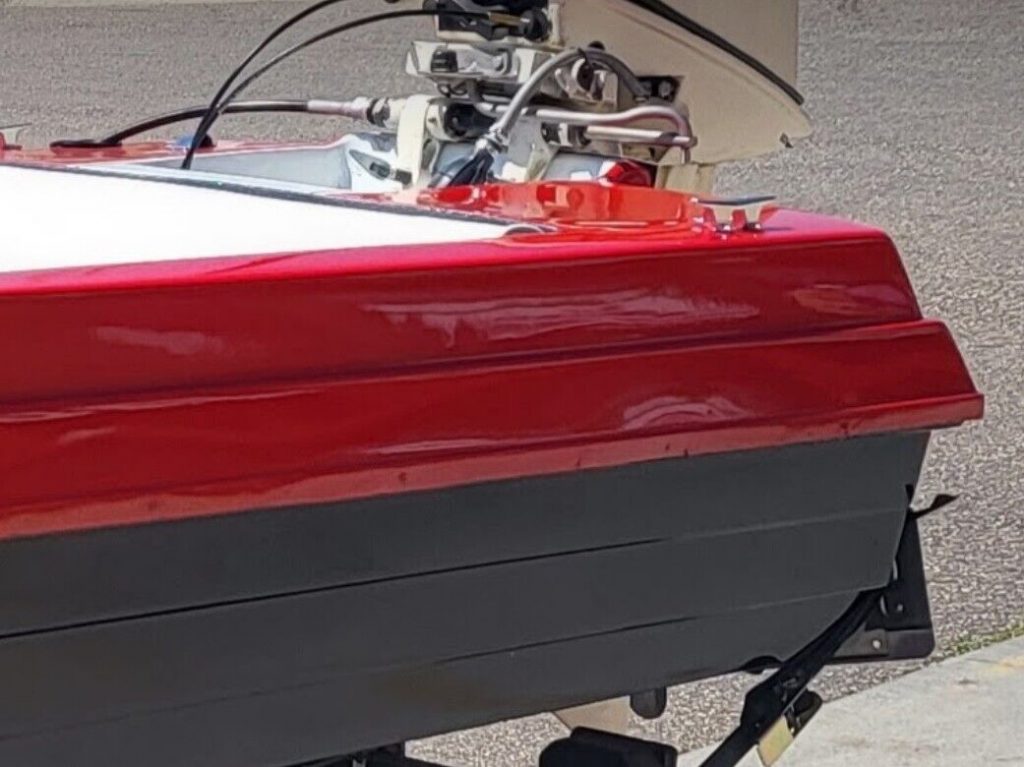 1984 Baja Scat Cat Mini Boat with a 25HP Outboard Motor. Recently Painted